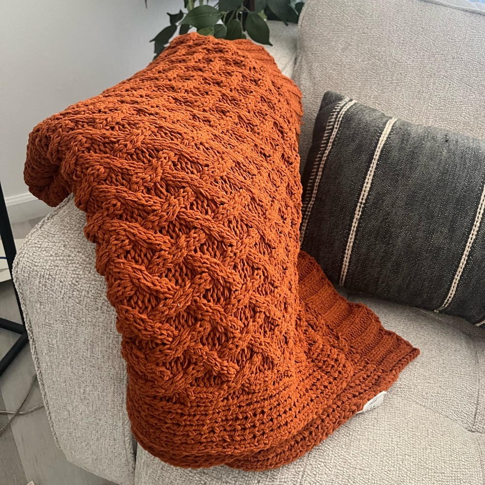 Orange/brown throw blanket
